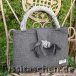 Handtasche aus grauer Woll-Kaschmir-Mischung mit Knotenschleife. Innenfutter magenta, Verkauft.
